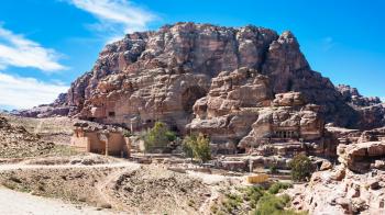 Travel to Middle East country Kingdom of Jordan - view of Temple of Dushares and Unfinished Tomb in Petra town in winter