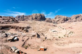 Travel to Middle East country Kingdom of Jordan - above view of bedouin camp in ancient Petra town in winter