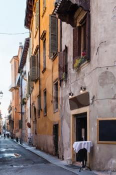 travel to Italy - street via Ponte Pietra in Verona city in spring evening