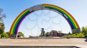 travel to Ukraine - view of rainbow painted Arch of Diversity (Friendship of Nations Arch, Arch of Friendship of People), Kyiv Pride Parade symbol in Kiev city in spring