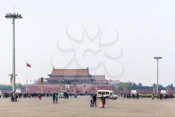 BEIJING, CHINA - MARCH 19, 2017: people and view The Tiananmen monument (Gate of Heavenly Peace) on Tiananmen Square in spring. Tiananmen Square is central city square in Beijing