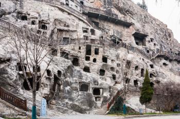 LUOYANG, CHINA - MARCH 20, 2017: many carved caves in West Hill of Chinese Buddhist monument Longmen Grottoes. The complex was inscribed upon the UNESCO World Heritage List in 2000