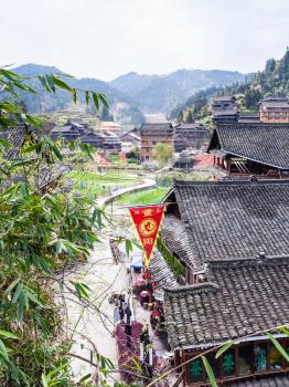 CHENGYANG, CHINA - MARCH 27, 2017: above view of shopping street in Chengyang village of Sanjiang Dong Autonomous County in spring. Chengyang includes eight villages of the Dong people