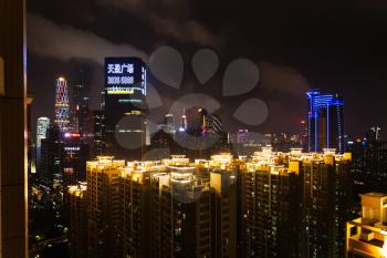 GUANGZHOU, CHINA - MARCH 31, 2017: night skyline of Guangzhou city with modern residential district. Guangzhou is the third most-populous city in China with population about 13,5 mln