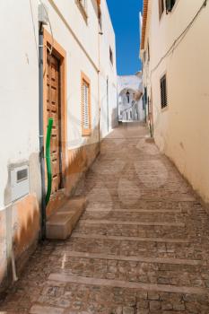Travel to Algarve Portugal - narrow pedestrian street in old town of Albufeira city