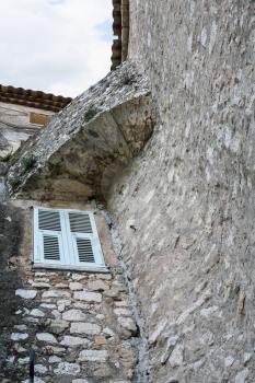 Travel to Provence, France - window in wall of medieval house in town Eze