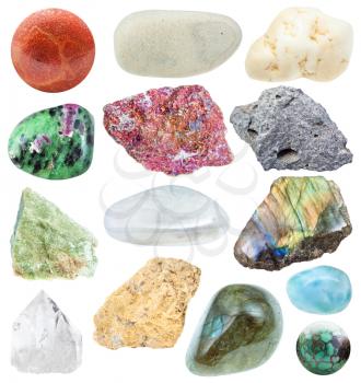various samples on natural mineral rocks isolated - larimar, turquoise, rock crystal, basalt, narsarsukite, coral, limestone, chalcopyrite, vesuvianite, labradorite, zoisite, magnesite, moonstone