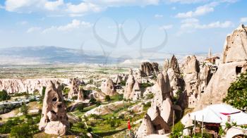 Travel to Turkey - fairy chimney rocks near Uchisar castle in Cappadocia in spring