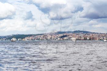 Travel to Turkey - view of Istanbul city on watefront of Golden Horn bay in spring