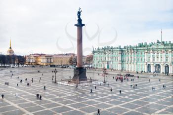 above view of Palace Square with Alexander Column and Winter Palace, and Admiralty building in Saint Petersburg city in march evening