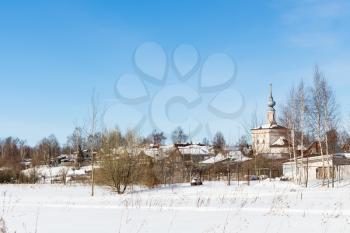 cityscape of Suzdal town with Tikhvinskaya Church in winter in Vladimir oblast of Russia
