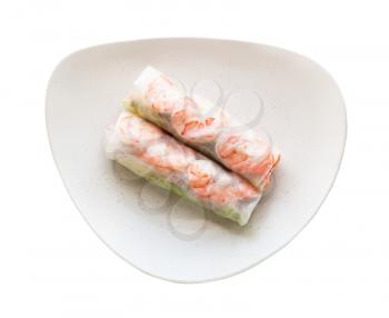 top view of Nem cuon (fresh Vietnamese nem roll with shrimps, and vegetables) on white plate isolated on white background