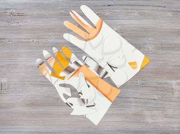 workshop on sewing gloves - top view of paper models of gloves on wooden table