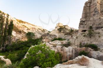 Travel to Turkey - overgrown rocks in gorge near Goreme town in Cappadocia in spring