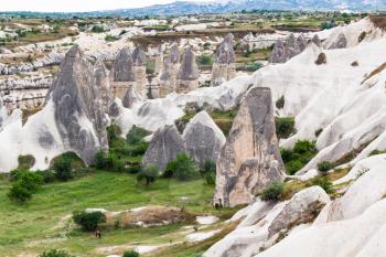 Travel to Turkey - fairy chimney rocks and rock-cut houses in Goreme National Park in Cappadocia in spring