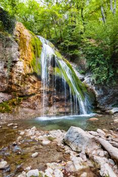 travel to Crimea - Djur-djur waterfall on mountain Ulu-Uzen river in Haphal Gorge of Habhal Hydrological Reserve natural park in Crimean Mountains in autumn