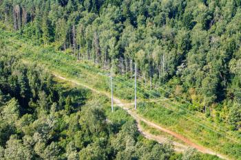 above view of country road in green forest in Moscow Region near Nakhabino settlement of Krasnogorsk town in summer day