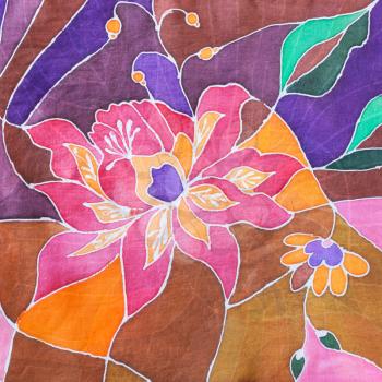 textile background - hand painted stylized flower on silk batik scarf