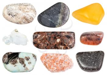 collection of natural mineral specimens - set of various polished stones (aventurine, albite, pegmatite, urtite, olivinite, dunite, chromite, irnimite, brucite) isolated on white