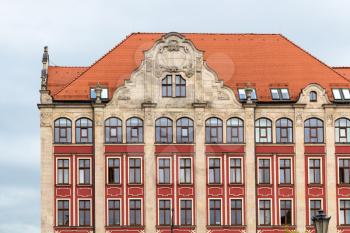 travel to Poland - facade of old urban palace in Wroclaw city on square Plac Solny in september