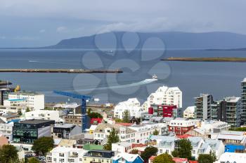 travel to Iceland - above view of Midborg district and port in Reykjavik city from Hallgrimskirkja church in september