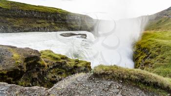 travel to Iceland - water current of Gullfoss waterfall in canyon of Olfusa river in september