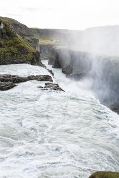 travel to Iceland - Gullfoss waterfall falls in canyon of Olfusa river in september