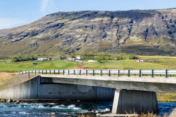 travel to Iceland - view of bridge over Bruara river at Laugarvatnsvegur road in autumn