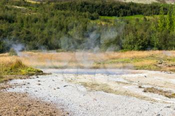travel to Iceland - pool of big geyser in Haukadalur valley in september