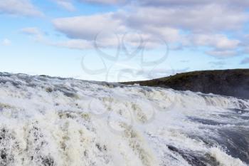 travel to Iceland - view of rapids of Gullfoss waterfall close up on Olfusa river canyon in autumn