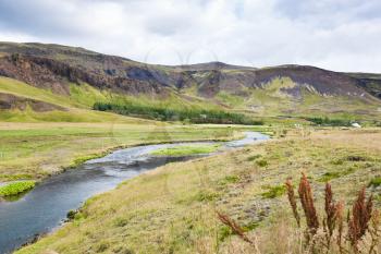 travel to Iceland - riverbanks of Varma river in Hveragerdi Hot Spring River Trail area in september
