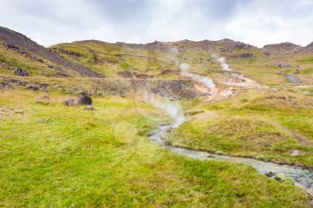 travel to Iceland - hot water flow in Hveragerdi Hot Spring River Trail area in september