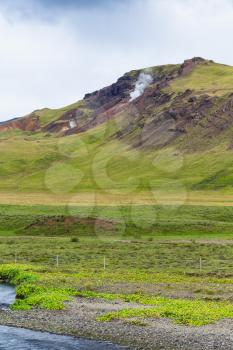 travel to Iceland - mountain slope in Hveragerdi Hot Spring River Trail area in september