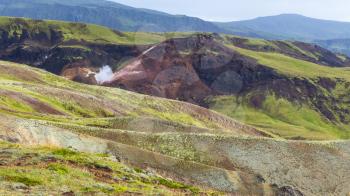 travel to Iceland - mountains slopes in Hveragerdi Hot Spring River Trail area in september