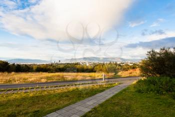travel to Iceland - roads at Oskjuhlid Hill and view of Reykjavik city in september evening