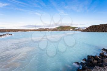 travel to Iceland - view of Blue Lagoon Geothermal lake in Grindavik lava field outside spa resort in autumn evening