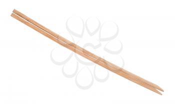 disposable brown wooden chopsticks put together isolated on white background