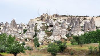 Travel to Turkey - rock-cut ancient houses in Goreme National Park in Cappadocia in spring