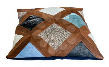 side view of handmade patchwork leather decorative pillow isolated on white background