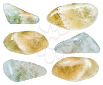 collection of various tumbled Prasiolite (green quartz , Vermarine) gemstones isolated on white background from Brazil