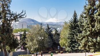 travel to Caucasian Mineral Waters region - view of Mount Elbrus from street in Pyatigorsk city in autumn morning