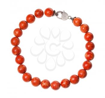 top view of necklace from polished red coral balls isolated on white background