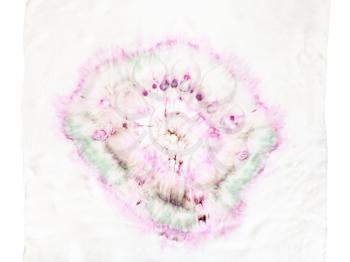 detail of white silk scarf with abstract pattern in tie-dye batik technique isolated on white background