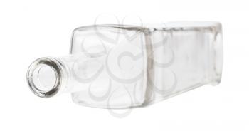 overturned empty clear wine bottle isolated on white background