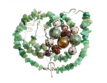 tangled handcrafted necklace from tumbled green aventurine gemstones, cracked agate ball, aplite, rhodonite and rudraksha beads isolated on white background