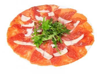 portion of Carpaccio (thinly sliced raw beef fillet) decorated by Parmesan, Arugula on white plate isolated on white background