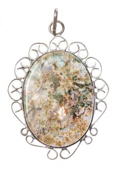 polished natural Moss Agate in vintage pendant isolated on white background