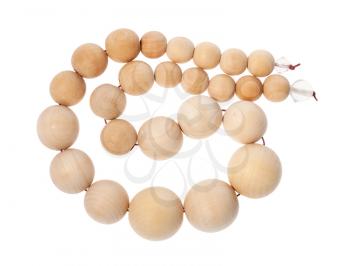 top view of coiled string of wooden beads isolated on white background
