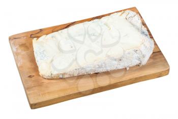 piece of local italian Gorgonzola soft blue cheese on olive wood cutting board isolated on white background