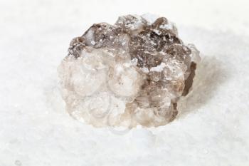 rough natural Halite mineral in grained Rock Salt close up